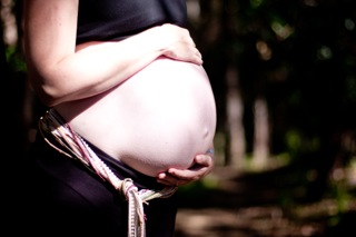 pregnant belly in the trees