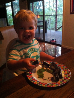 toddler eating sushi